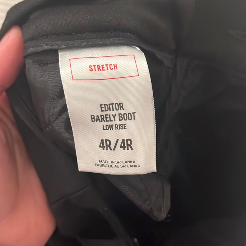 Black express editor barely boot low rise pants